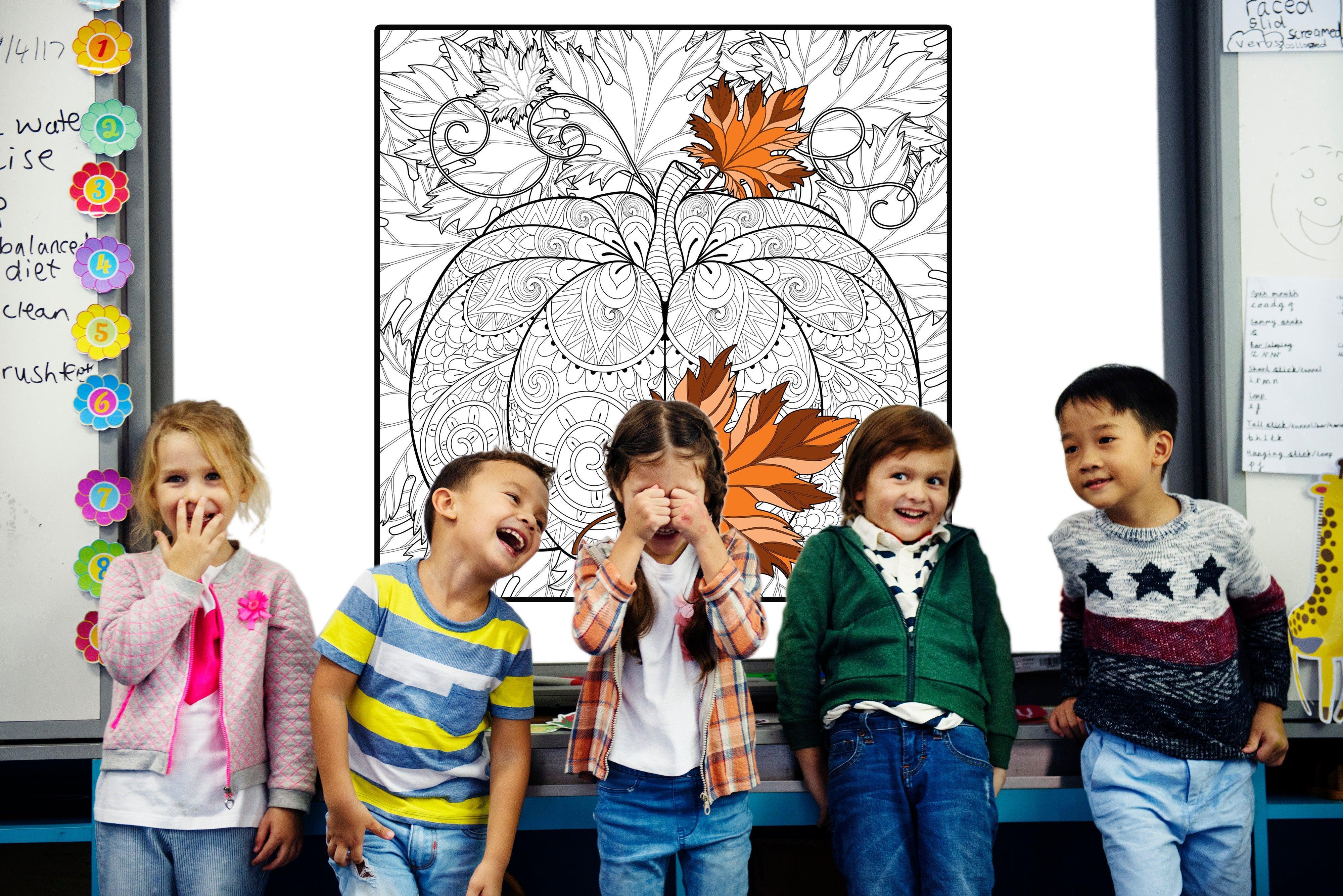 Five kids laughing in front of giant pumpkin mandala coloring poster 30x30 displayed in classroom — SJPrinter Cherry Hill NJ